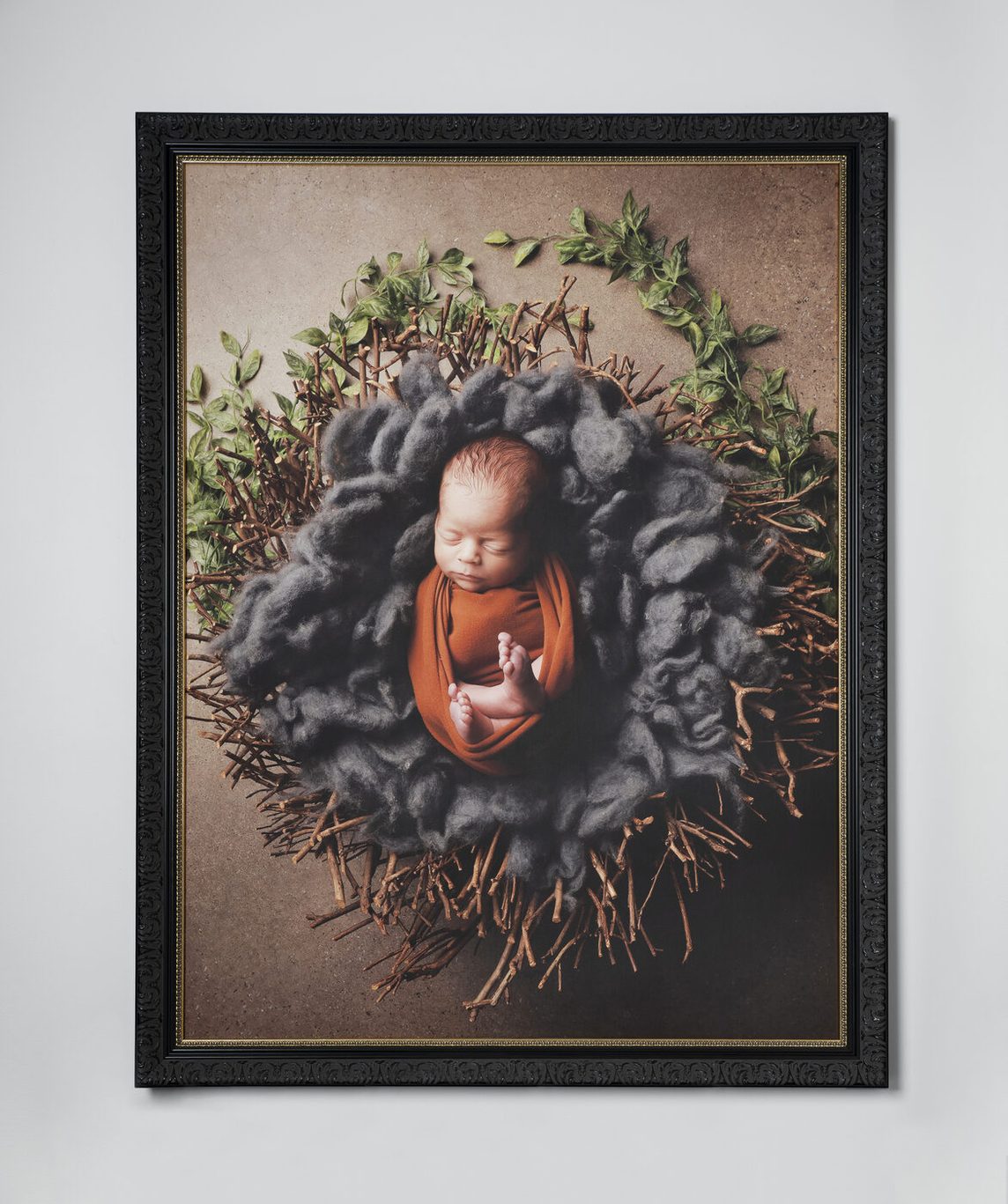 Custom framed newborn portrait